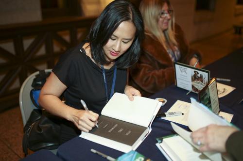 Celeste Ng signing copies of Little Fires Everywhere at the Ohioana Book Awards.