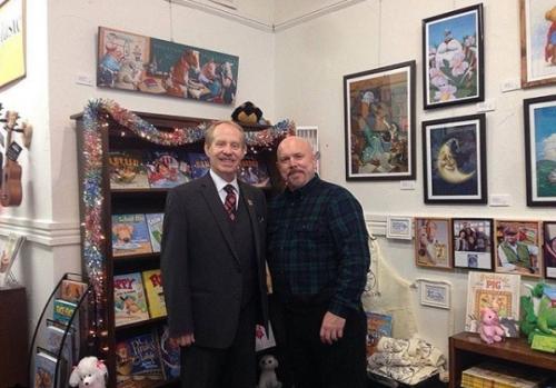 Ohioana's Executive Direction David Weaver visits  author and illustrator Tim Bowers, artist for the 2019 Ohioana Book Festival poster and owner of the Jolly Dog.