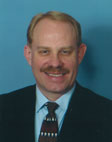 Color photograph (head and shoulders) of David E. Weaver.