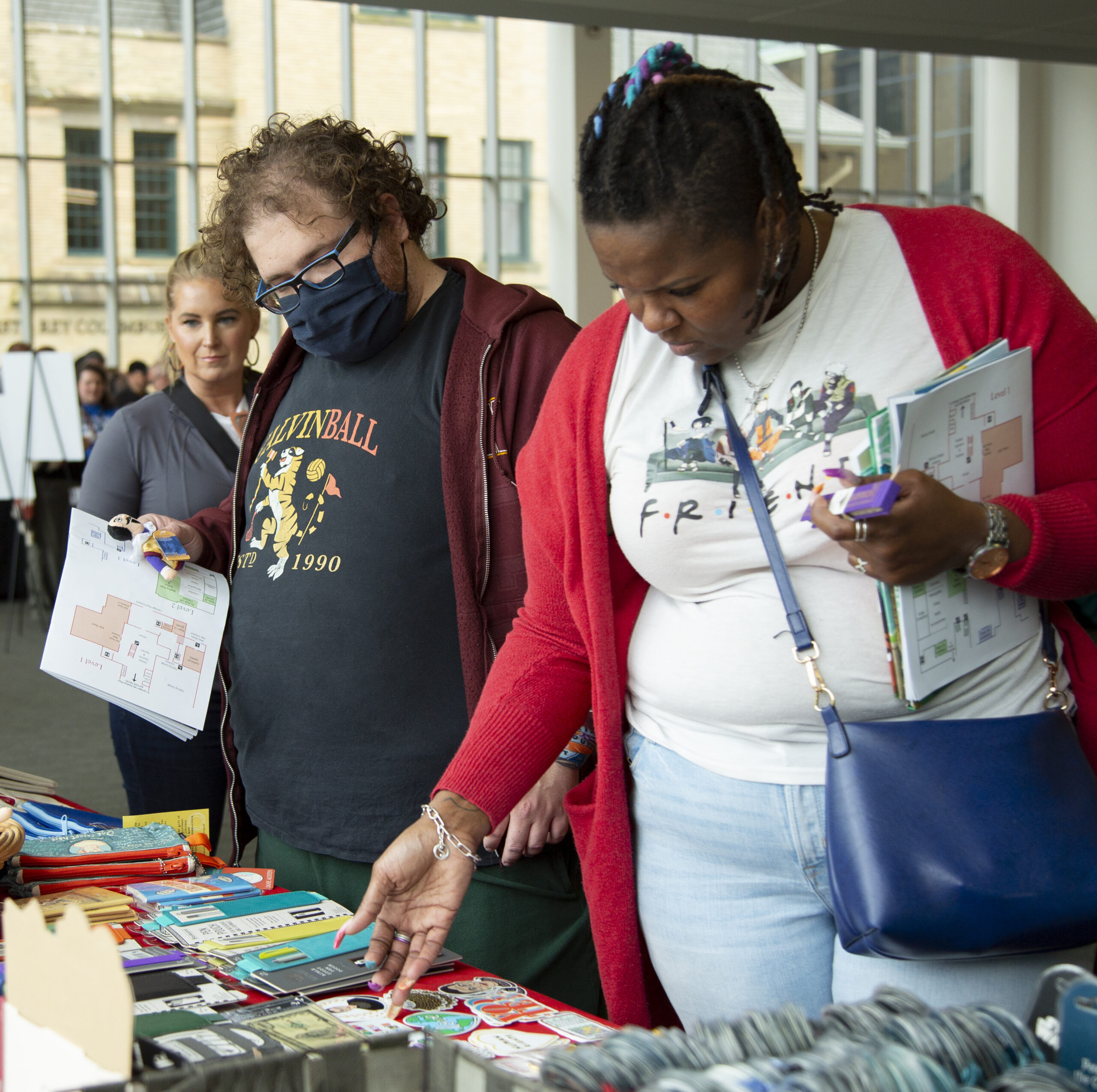 Festival attendees browse through some books.
